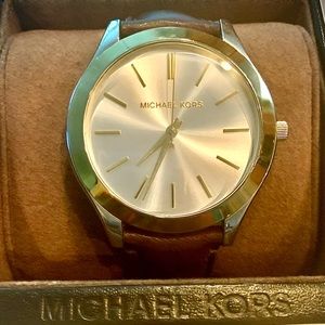 Michael Kors watch with leather band.